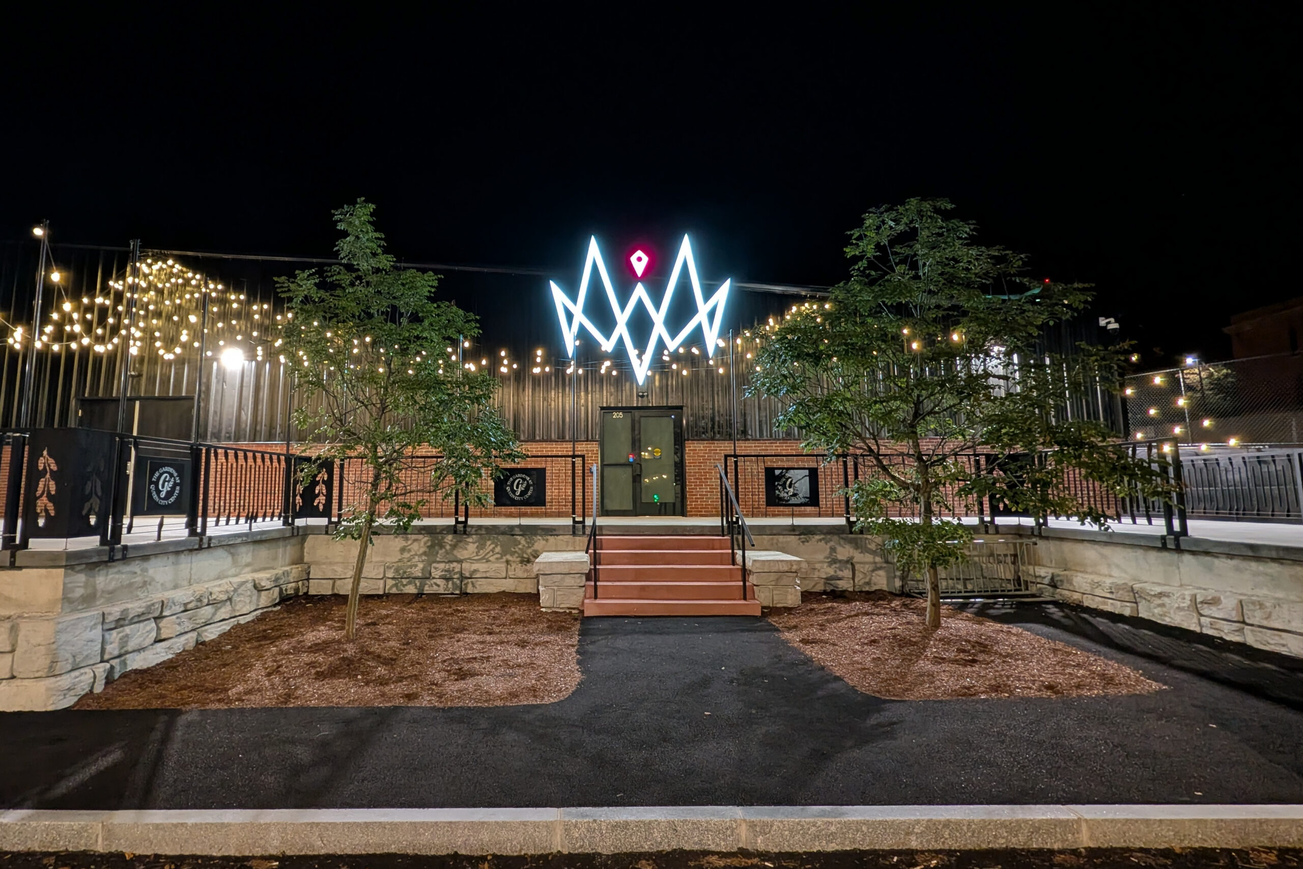 A photo of the exterior of The Gardens at Queen City Center